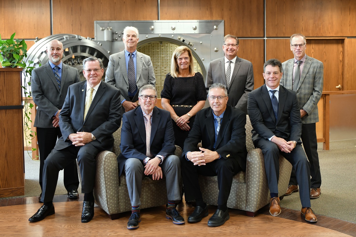The photo depicts the 9 members of the Forte Bank Board of Directors.