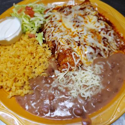 Enchilada dinner with beans and rice.