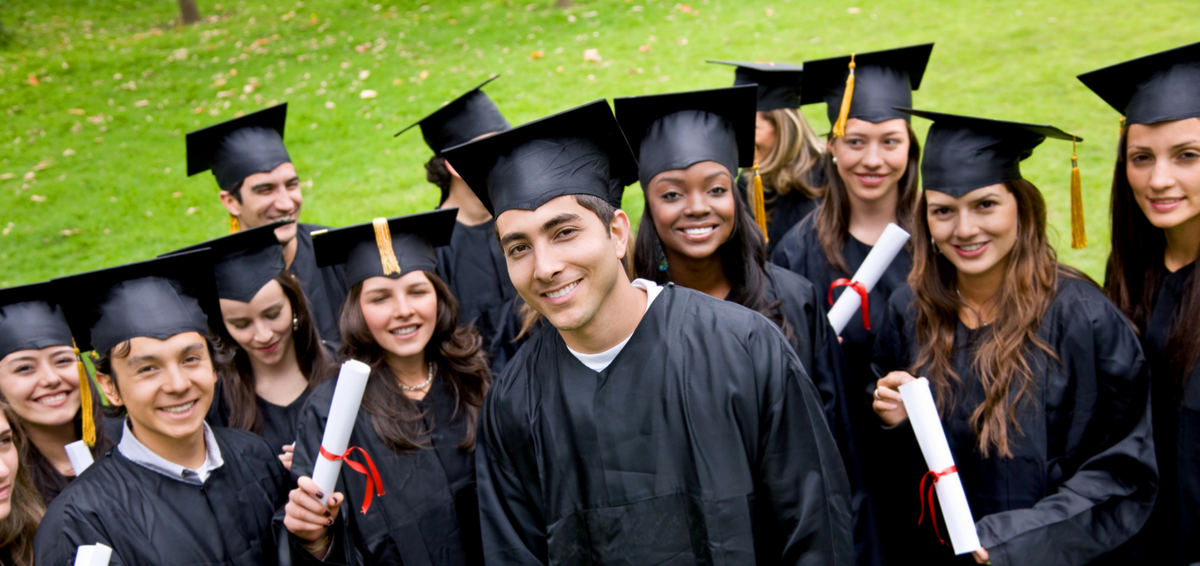 Graduates standing outside