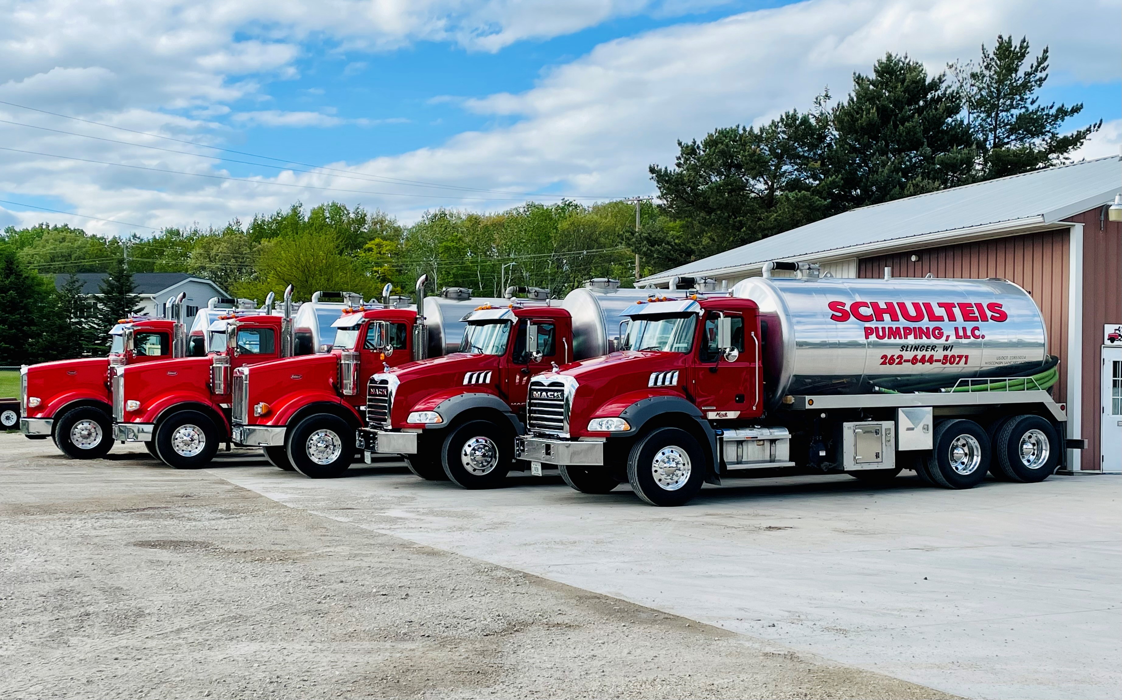 Five Schulteis Pumping trucks lined up in a row.